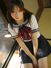Rei Amakusa plays with own shaved pussy