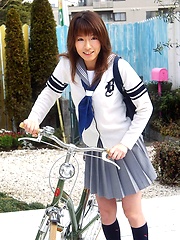 Towa Aino schoolgirl model shows off nice cleavage