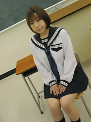 Schoolgirl Norika touching her smooth hole