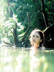 Neo Asian babe in white dress loves feeling her body in water