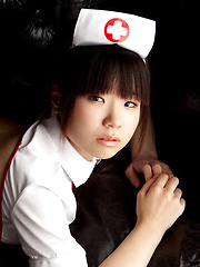 Hikari Azuma Asian shows pussy in tiny thong of nurse uniform