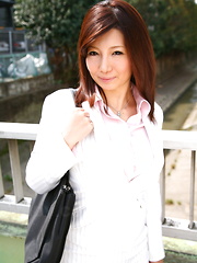 Sweet Sayuri Mikami poses in business suit